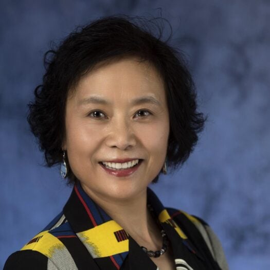 Jie Qi Chen smiles for her headshot.